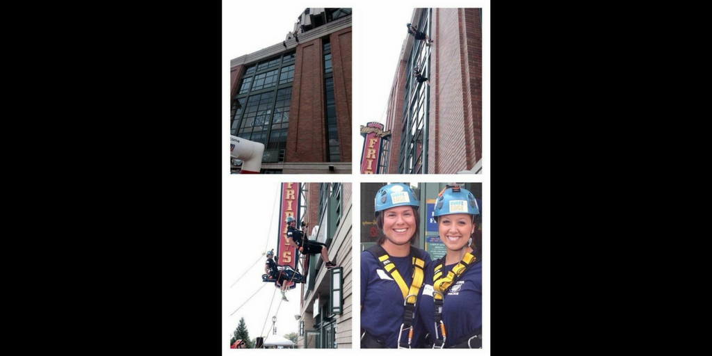 Officer Schaper going "Over the Edge" for SOWI at Miller Park with a friend