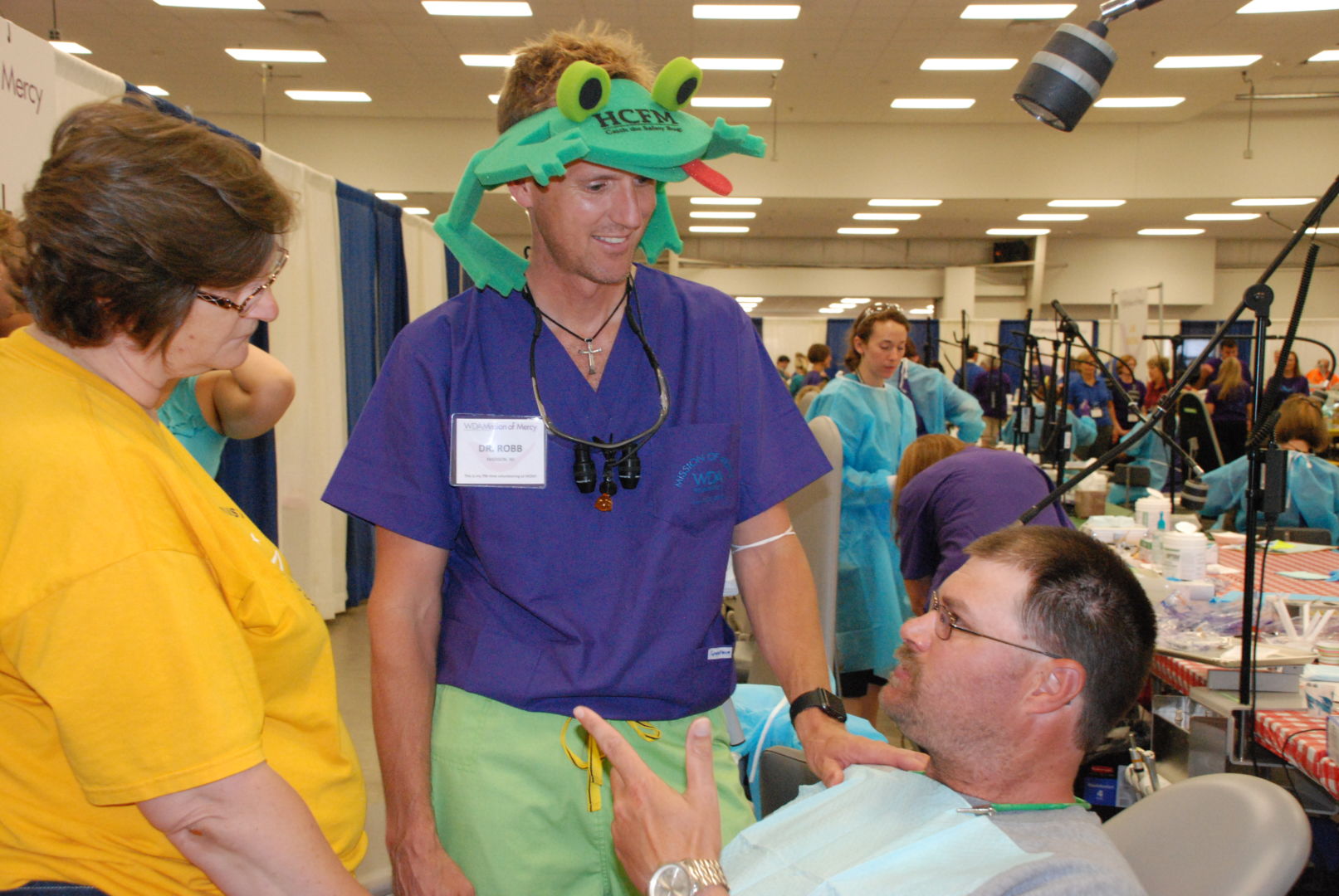 Dr. Warren and a patient at a Mission of Mercy event