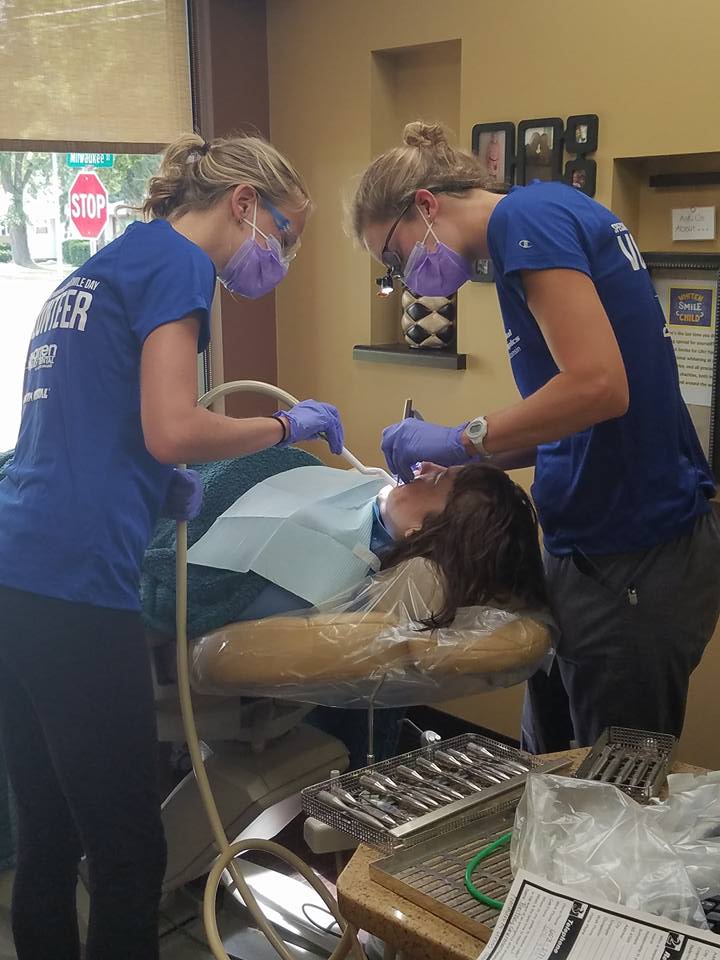 Volunteer dentists treat a SOWI athlete at the 2017 Give Athletes a Smile Day