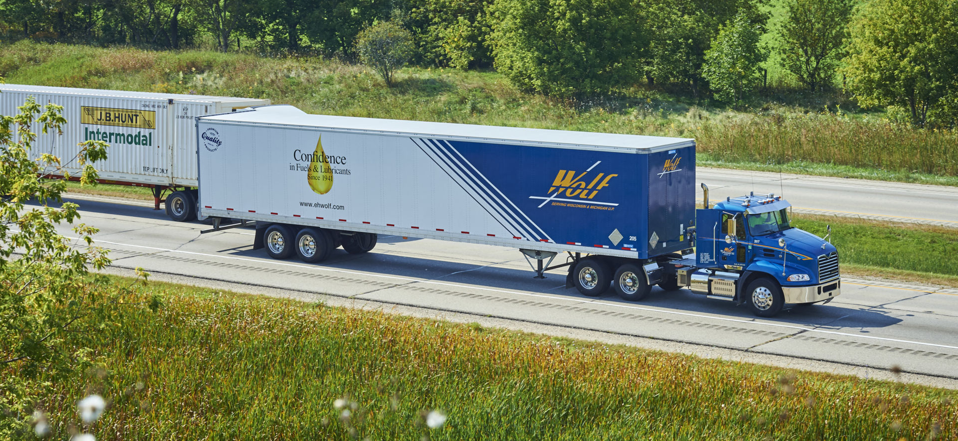 An E.H. Wolf & Sons Inc. truck cruises along during the 2017 Convoy