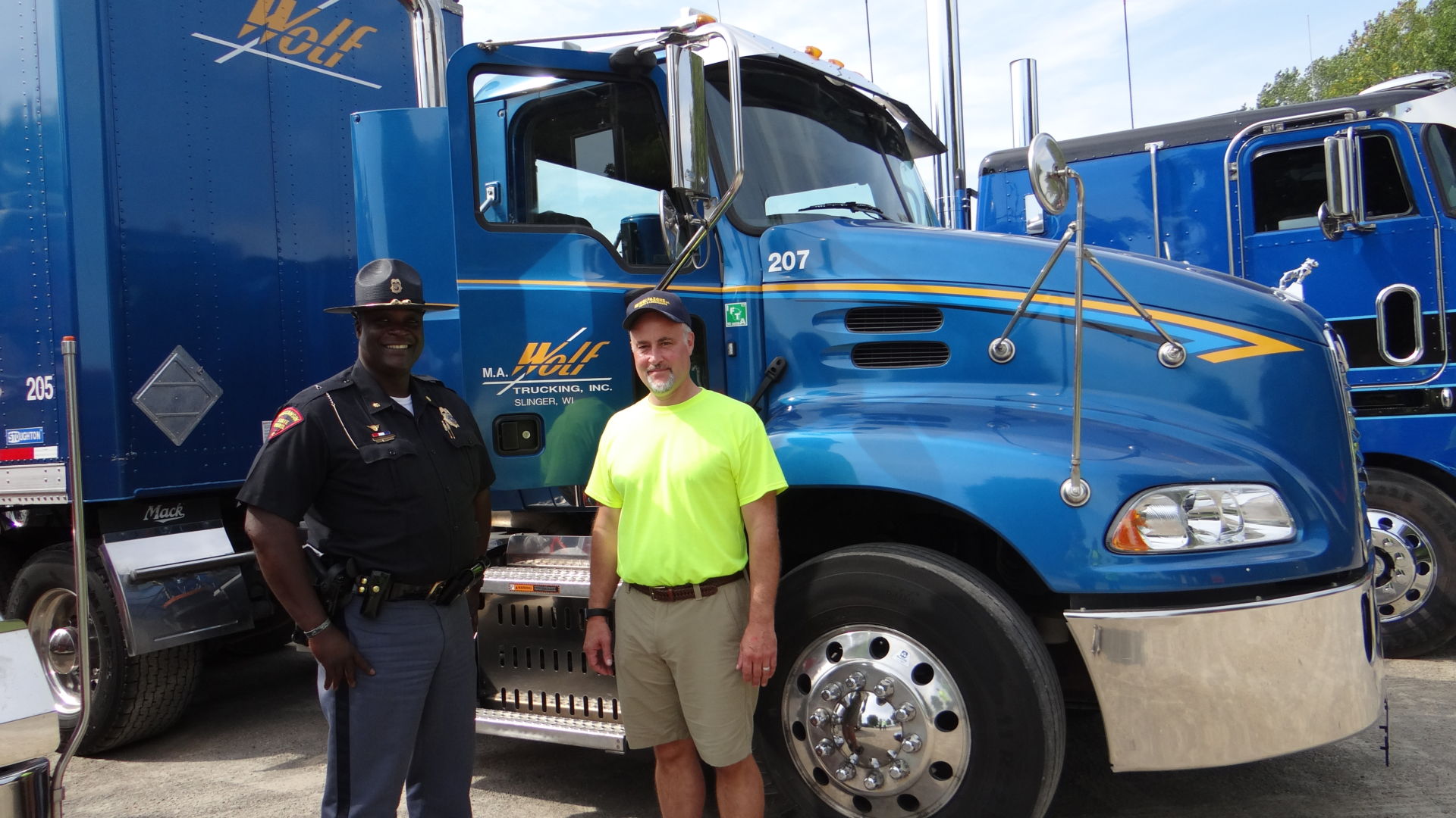 Major Anthony Burrell (L) and Craig Wolf, President of E.H. Wolf & Sons Inc.