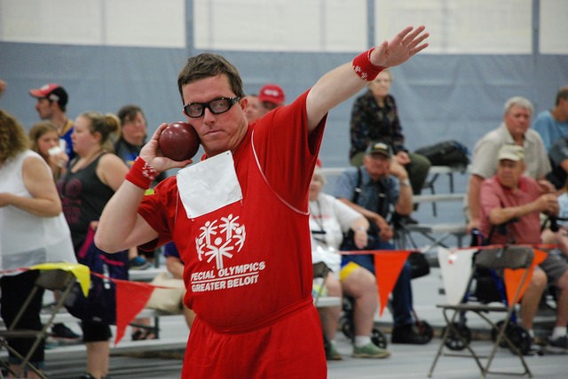 An athlete takes aim during shot put