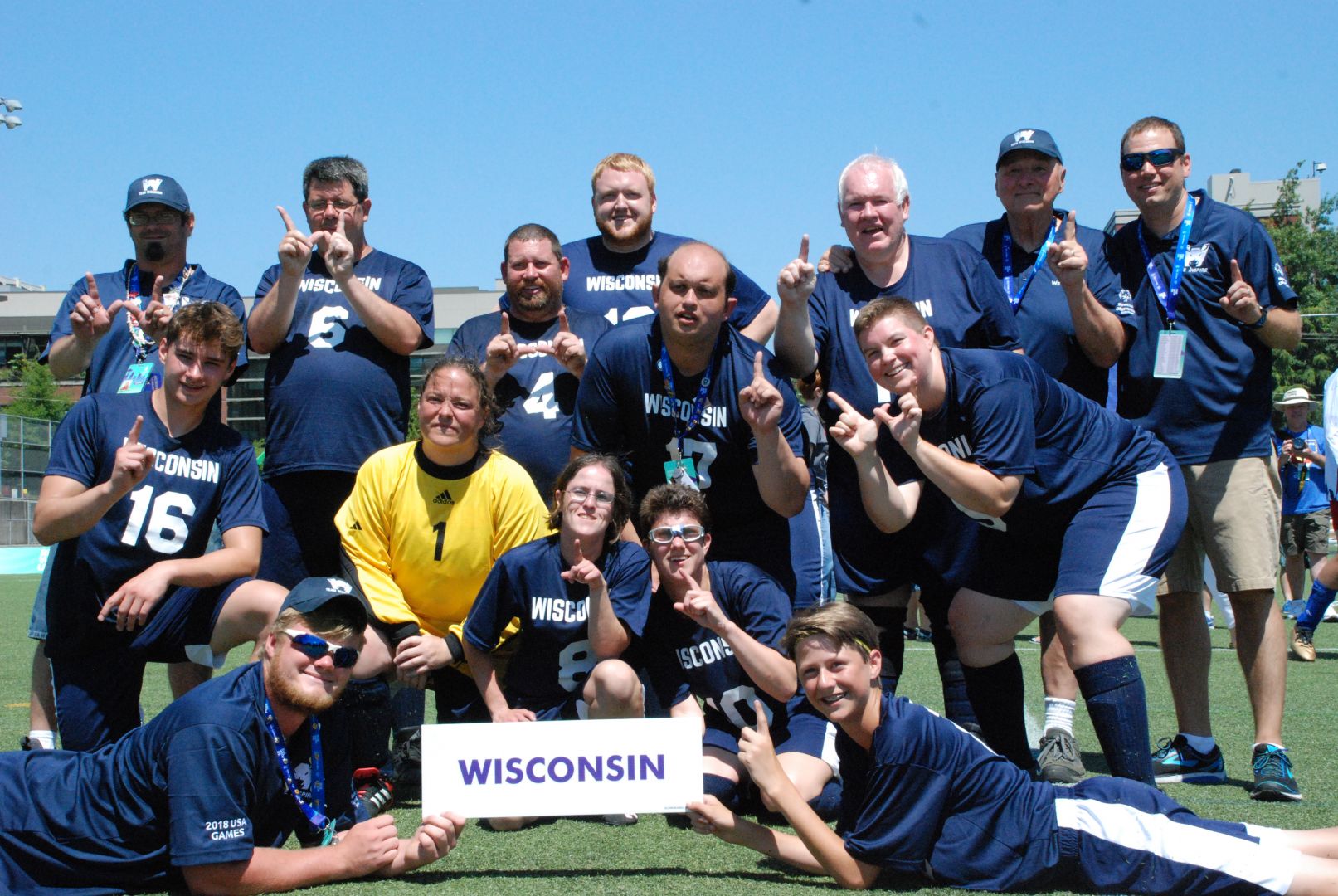 Team Wisconsin poses for a celebratory picture after capturing gold