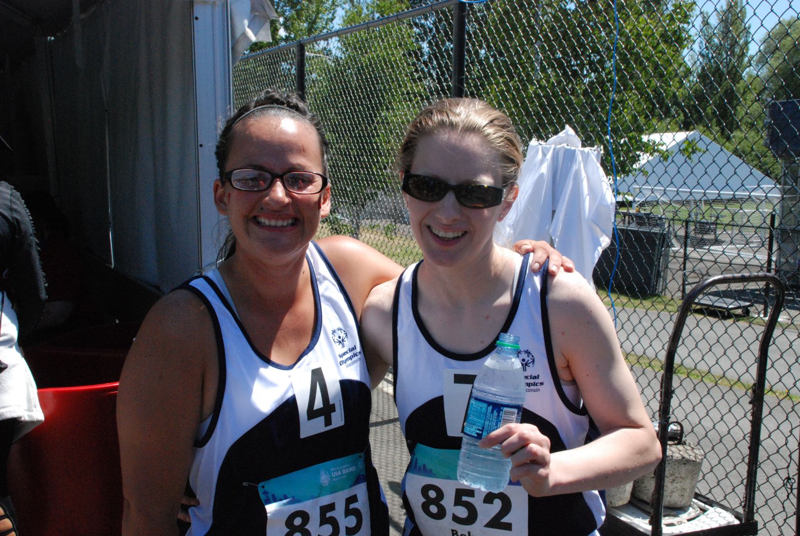 Crystal Fougner (L) and Lora Behr right after their 100-meter dash