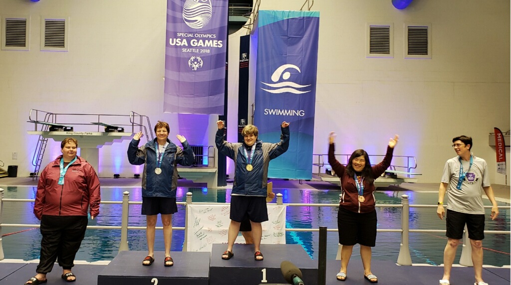 Kim Raatz celebrates her gold medal along with teammate Christine Cherne, who got silver