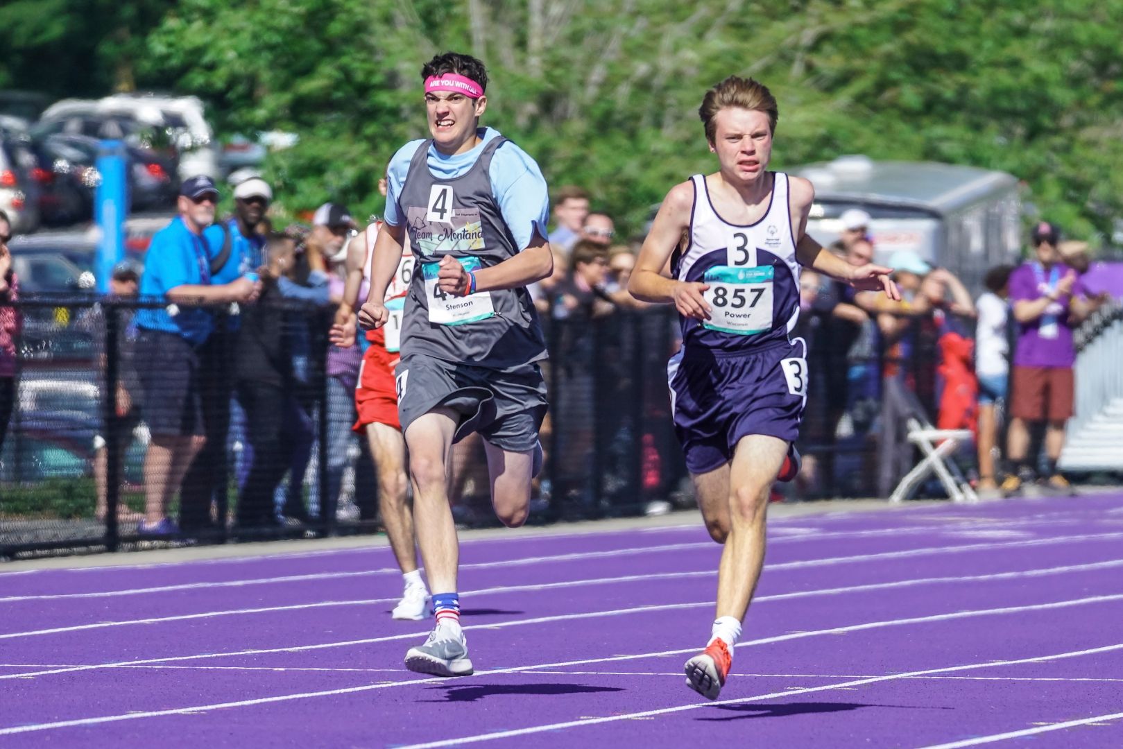 Stephen Power (R) pushes hard to hold off the competition in his silver-medal winning 200-meter dash